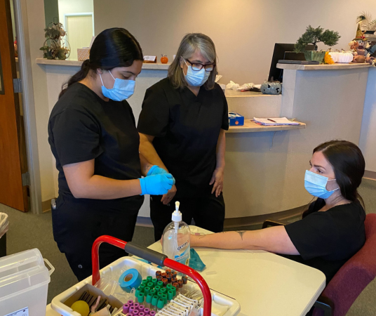 Medical Assistant School Students training with their instructor